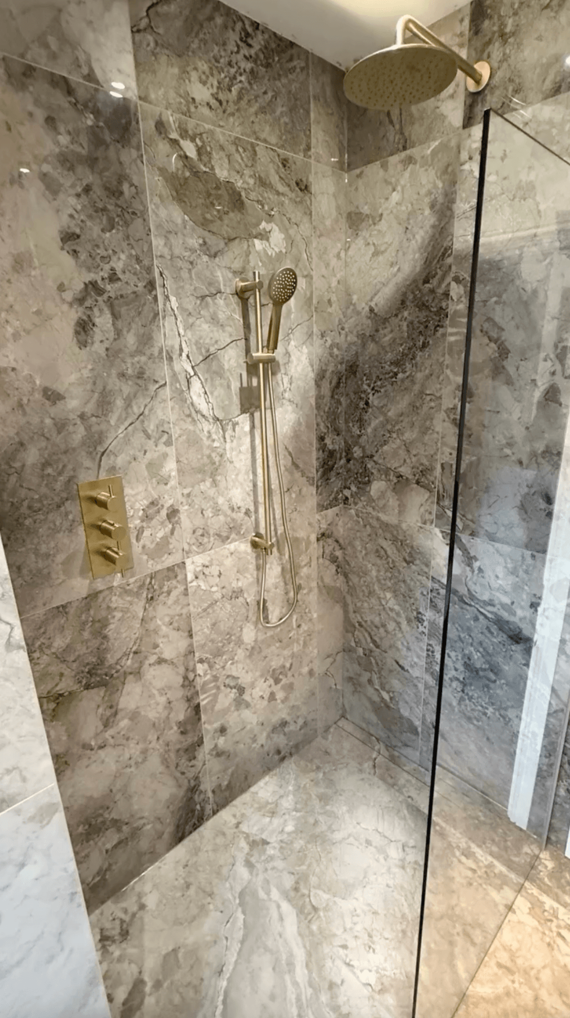 En-suite wetroom in Sprotbrough with bespoke basin and brushed brass details
