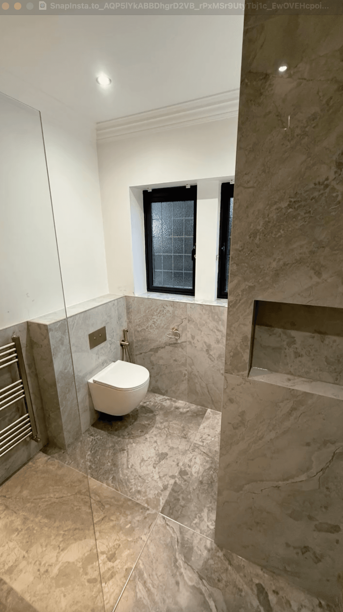 En-suite wetroom in Sprotbrough with bespoke basin and brushed brass details