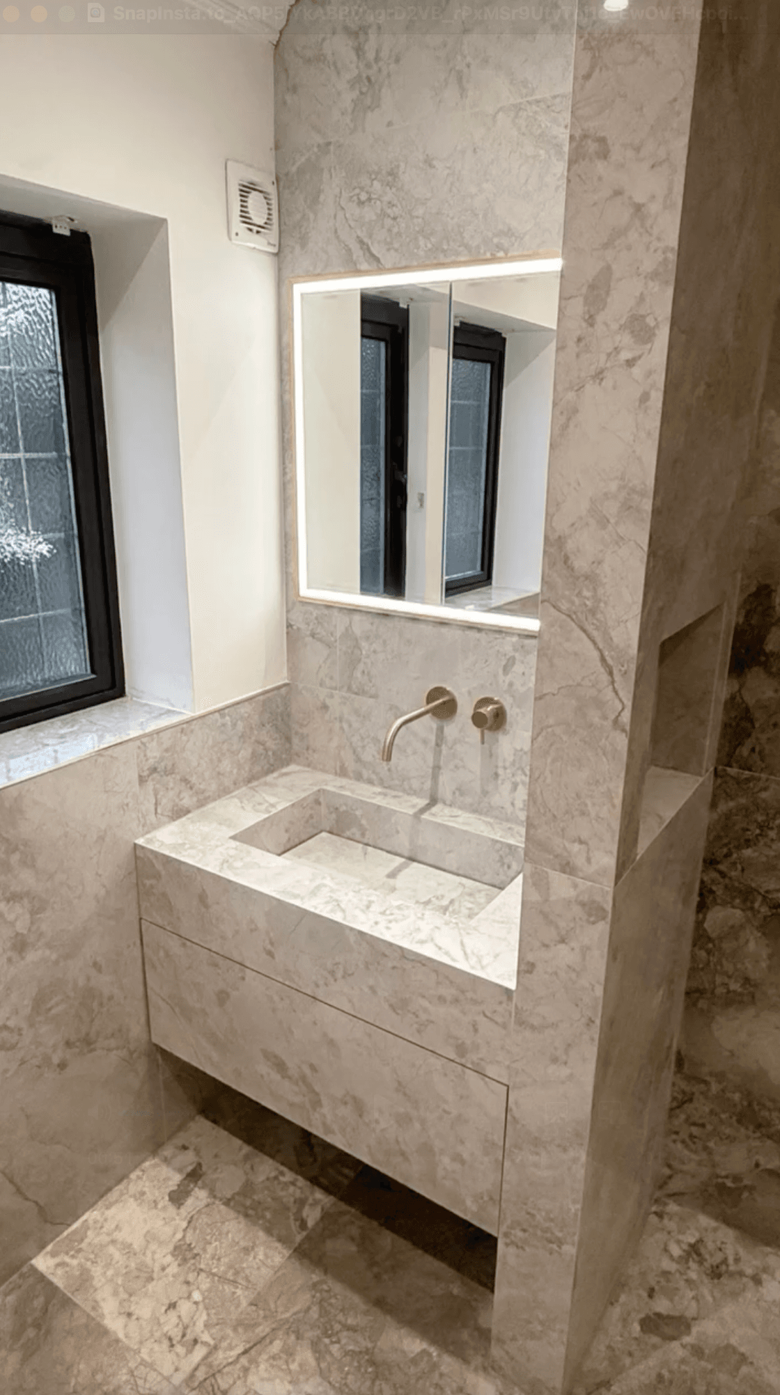 En-suite wetroom in Sprotbrough with bespoke basin and brushed brass details
