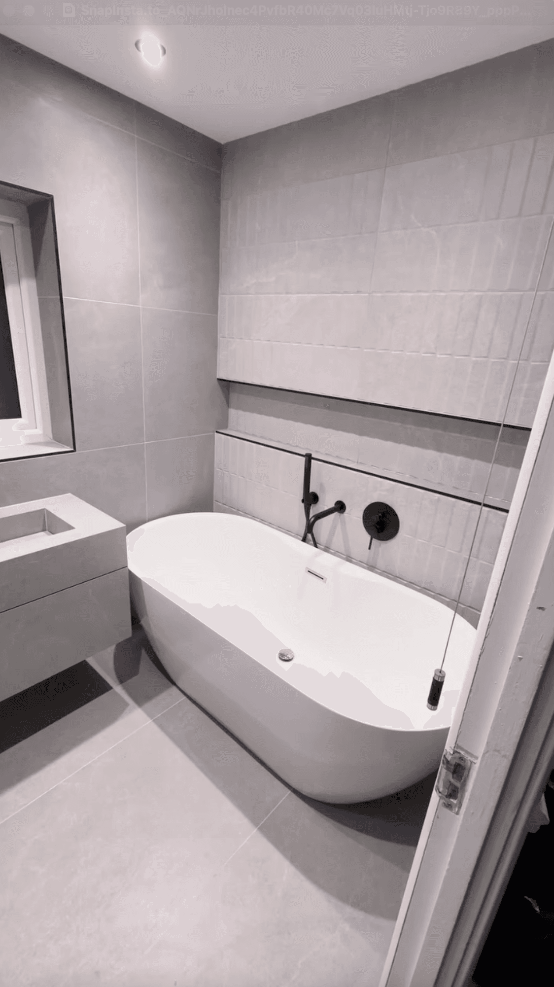 Main bathroom installation in South Anston with bath, vanity, shower and tiled finish