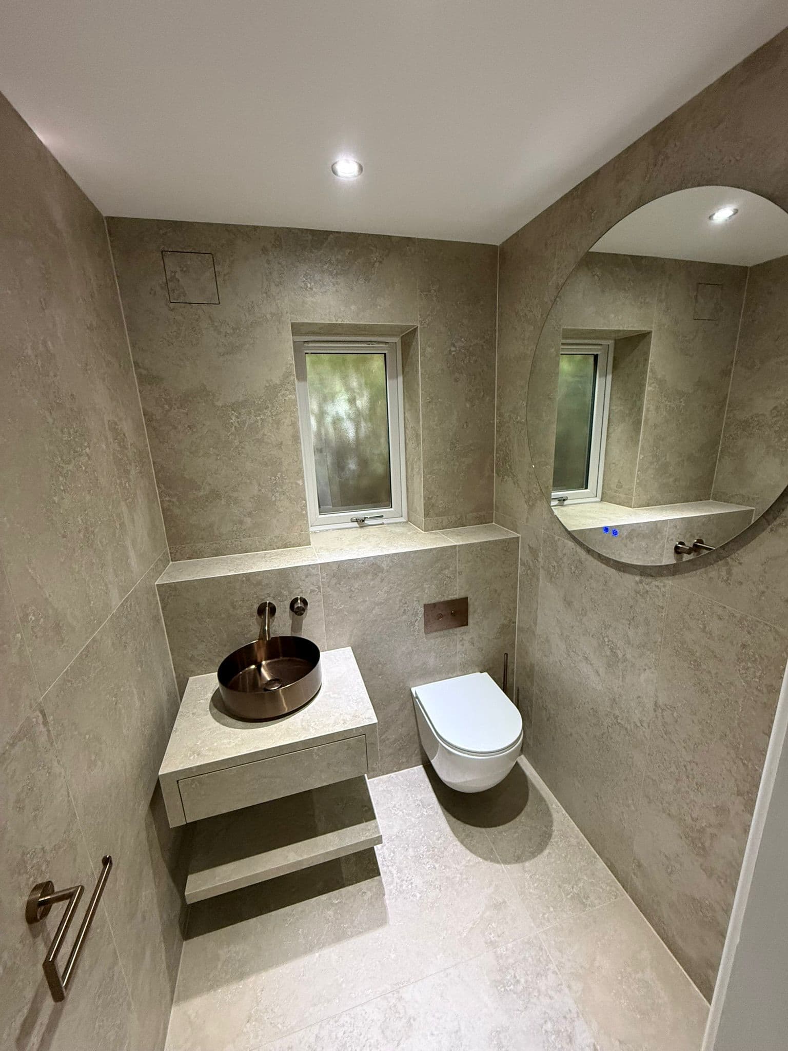 Beauty Space bathroom in Sprotbrough with bespoke vanity and bronze details