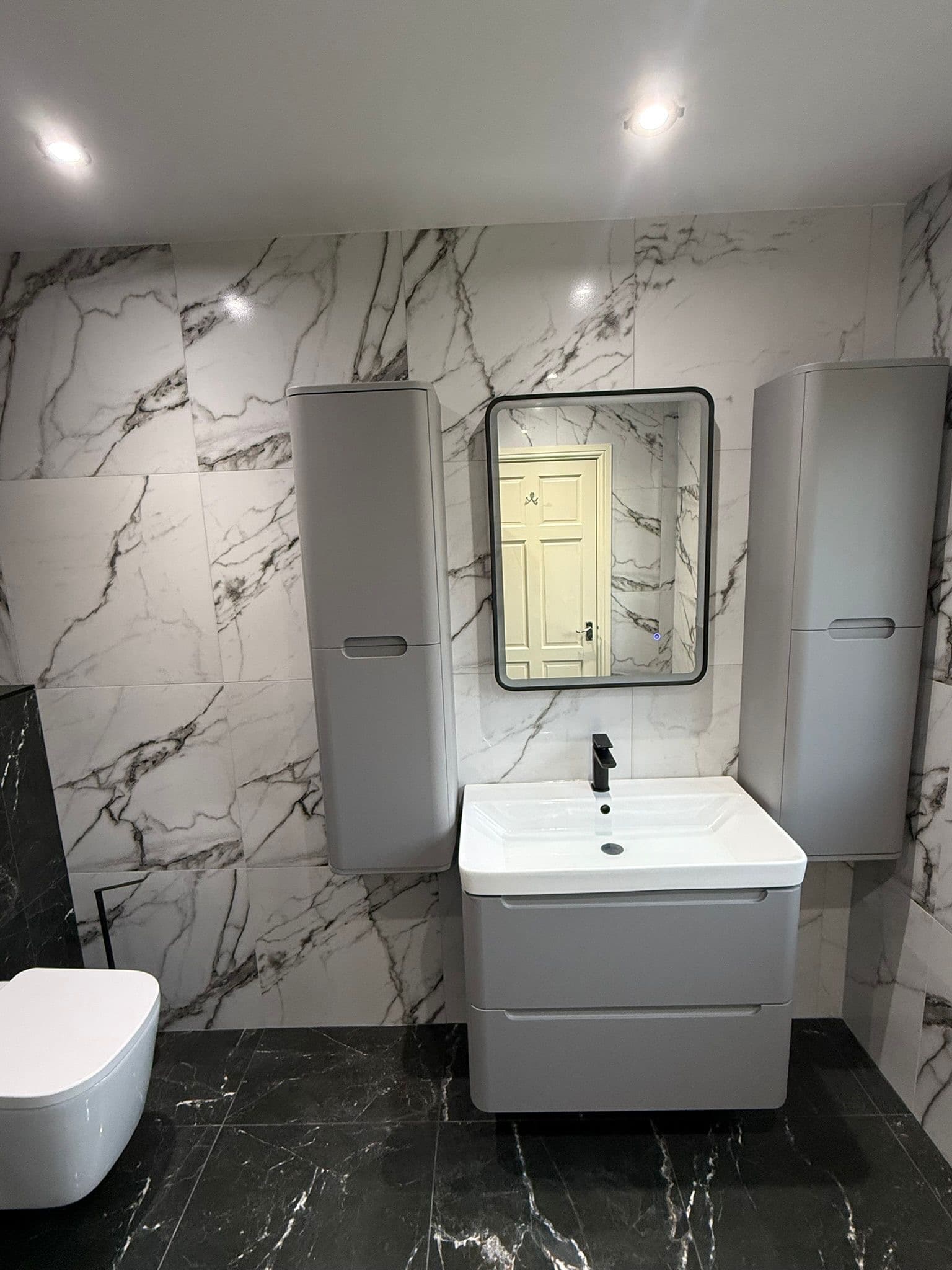 Retford wetroom with matt black fittings and walk-in shower