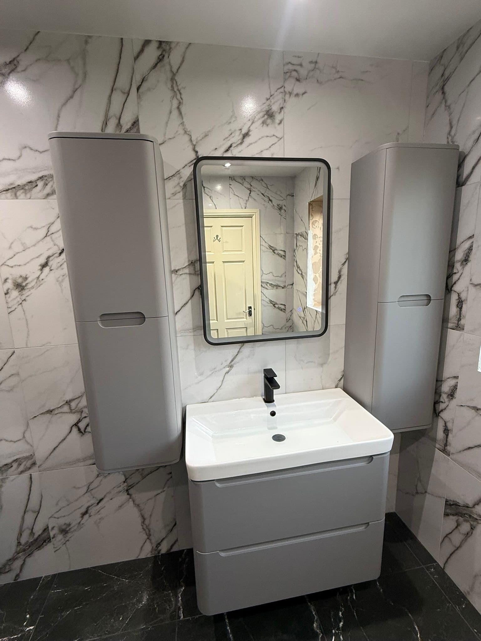 Retford wetroom with matt black fittings and walk-in shower
