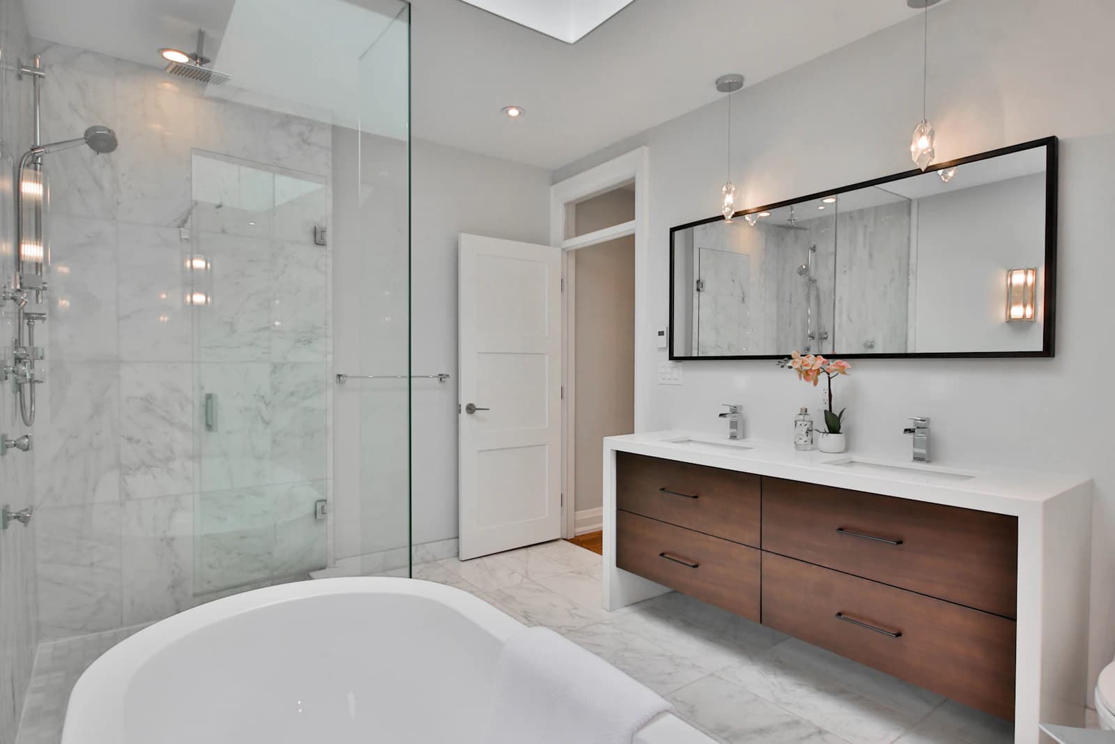 Marble-effect bathroom installed by Bespoke Tiling